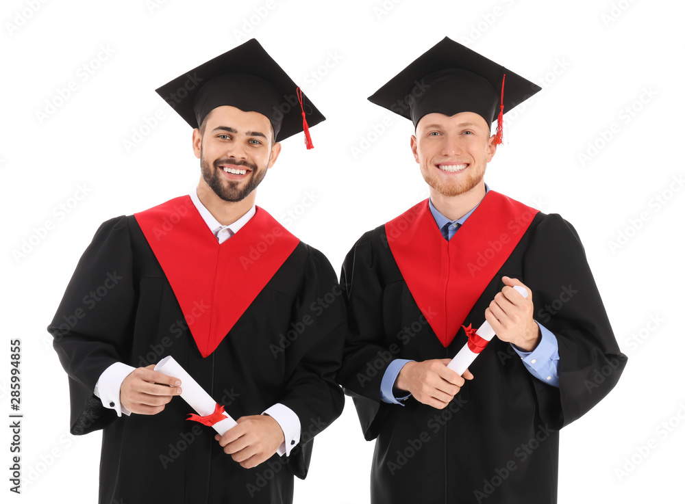 Young students in bachelor robes on white background Young students in bachelor robes on white background
