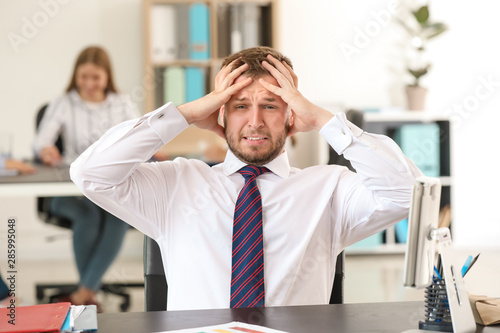 Businessman having panic at...