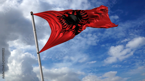 Flag of Albania with sky and Clouds in the background