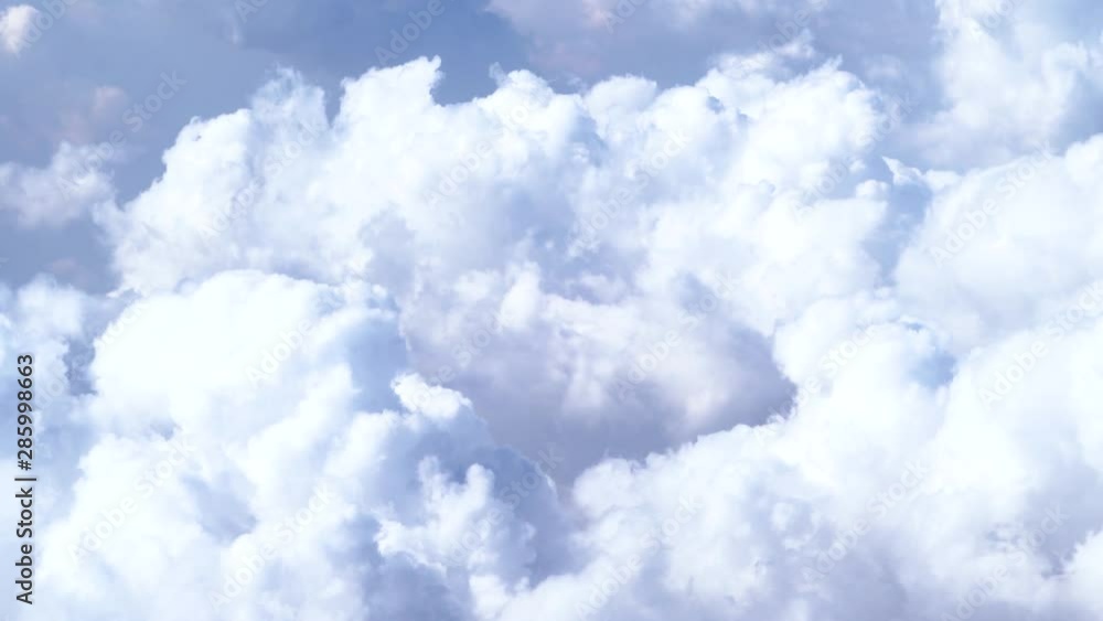 Beautiful white clouds in the blue sky in the morning through airplane view
