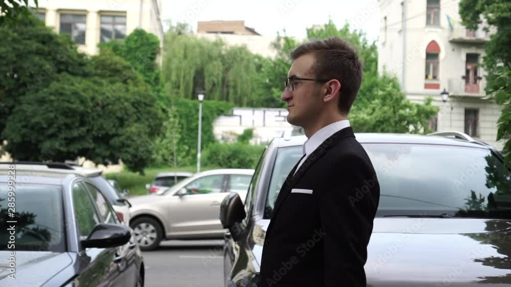 Businessman Walking On The Street, Man In The Suit, Going To The Work Businessman Walking On The Street, Man In The Suit, Going To The Work