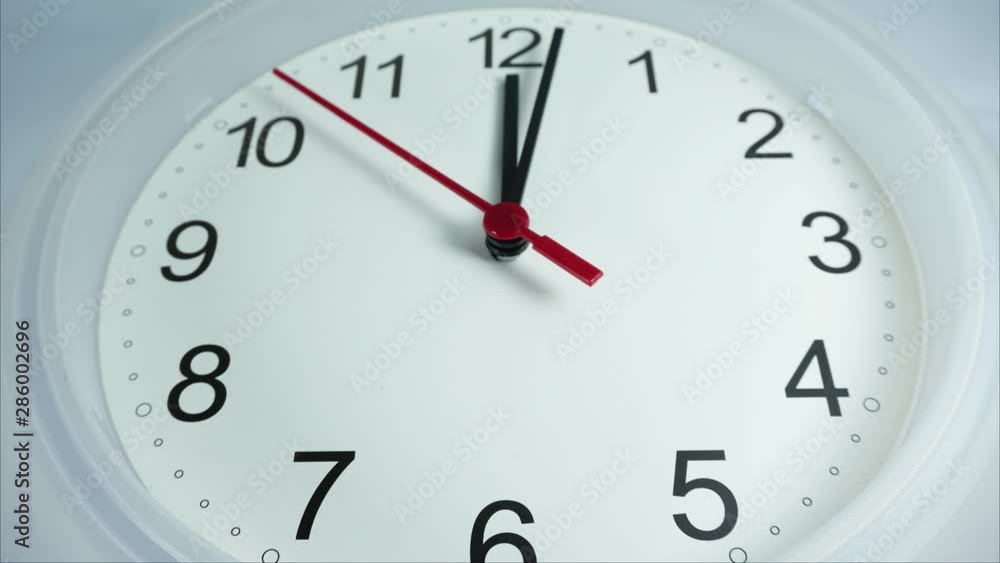 Clock White Time lapse 20 minutes moving fast on white background. Clock White Time lapse 20 minutes moving fast on white background.