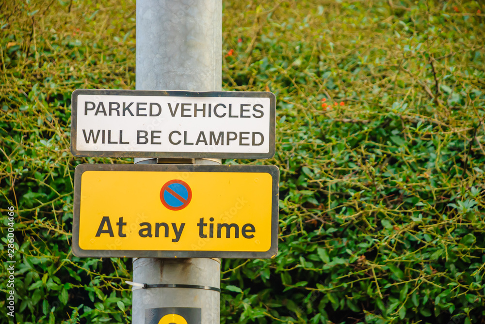 No Parking signs, including one saying that vehicles will be clamped.