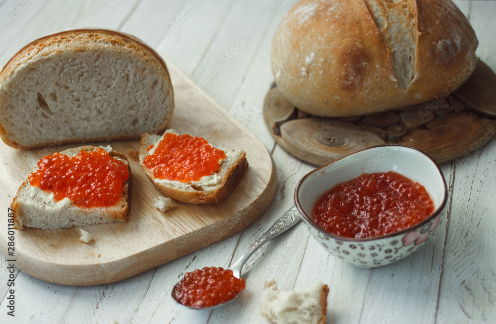 Far Eastern delicacy. Sandwich with caviar of red fish Far Eastern delicacy. Sandwich with caviar of red fish