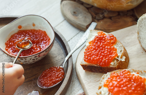 Far Eastern delicacy. Sandwich with caviar of red fish photo