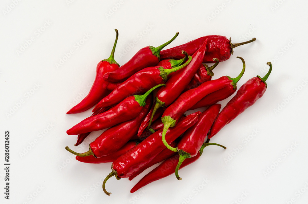 red chili or chilli cayenne pepper on white background