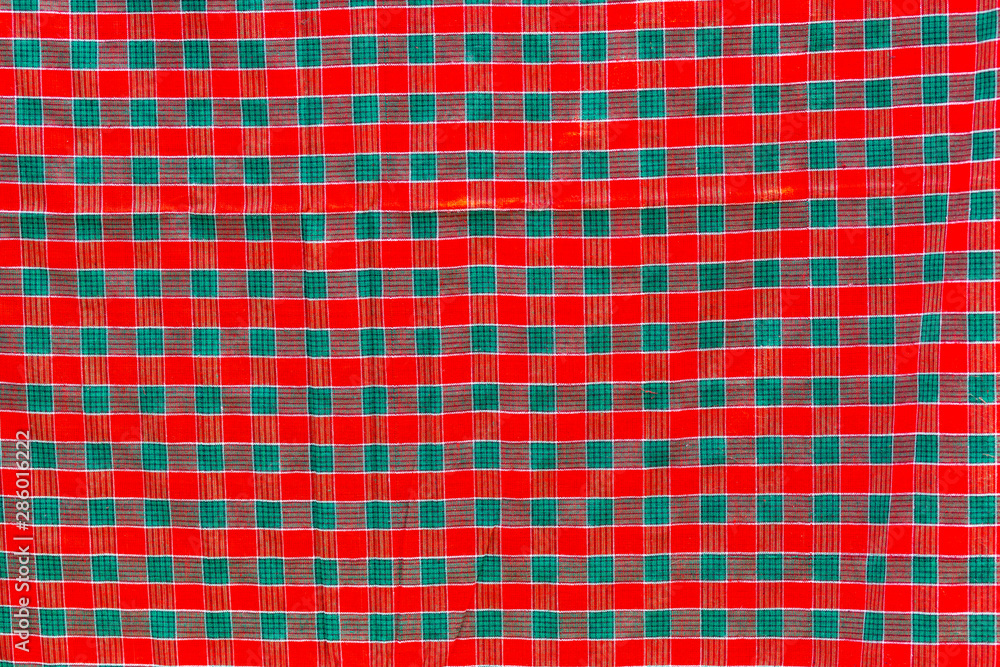 Green, red and white strip cotton Gamcha(Bath towel) Fabrics Close-up. Green, red and white strip cotton Gamcha(Bath towel) Fabrics Close-up.