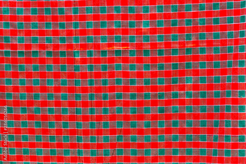 Green, red and white strip cotton Gamcha(Bath towel) Fabrics Close-up. Green, red and white strip cotton Gamcha(Bath towel) Fabrics Close-up.
