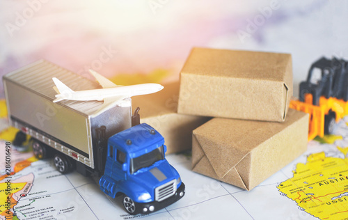 logistics transport import export shipping service Customers order things from via internet International shipping online Air courier Cargo plane boxes packaging freight forwarder to worldwid photo