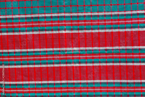 Red, blue and white strip cotton Gamcha(Bath towel) Fabrics Close-up. photo