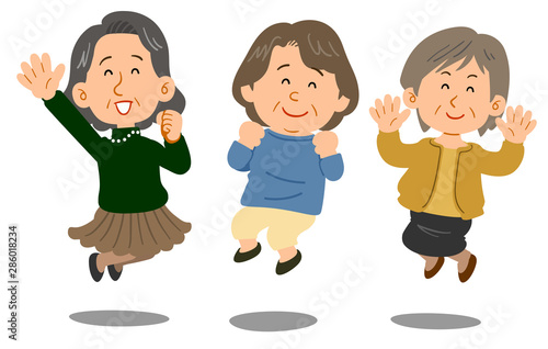 ジャンプする3人のシニアの女性 