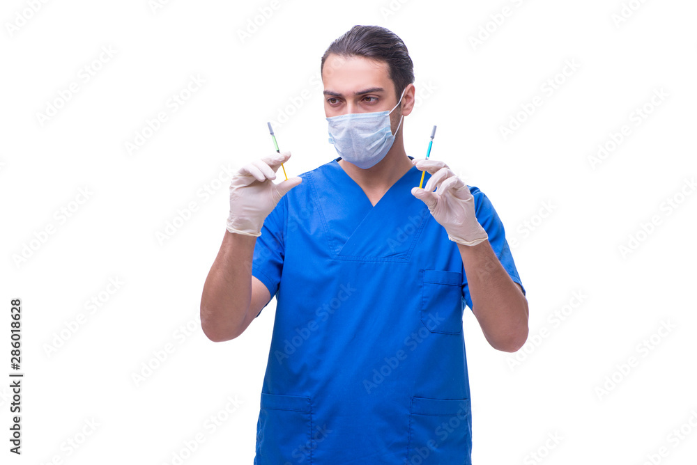 Young handsome doctor with syringe isolated on white Young handsome doctor with syringe isolated on white