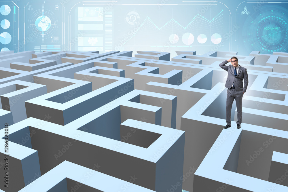 Businessman trying to escape from maze Businessman trying to escape from maze