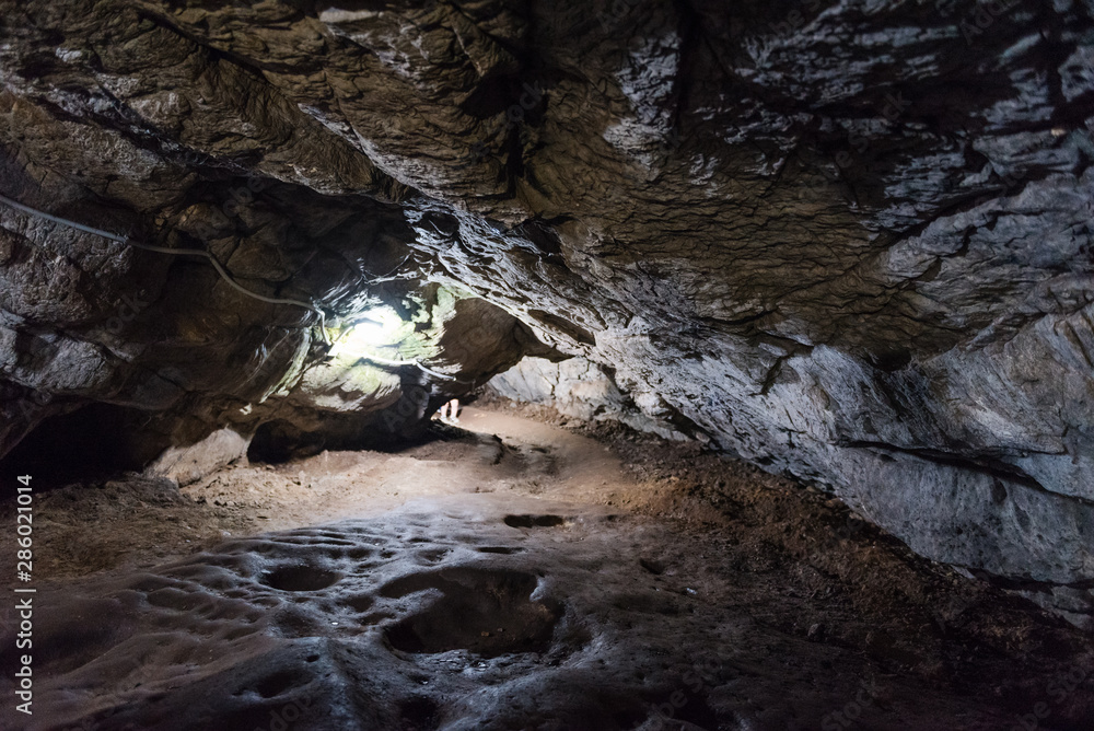 stone caves. caves in the mountains. visit the tour. leisure. large stones underground. tunnels in the mountains. stone tunnels.