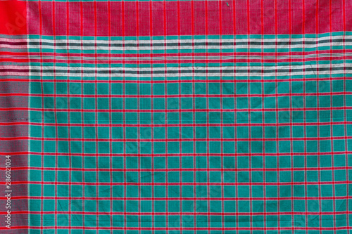 Red, Blue, Black and white strip cotton Gamcha(Bath towel) Fabrics Close-up. photo