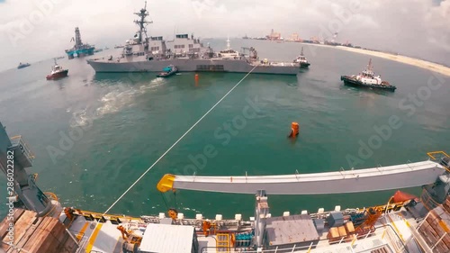 Timelapse of the USS John S McCain being loaded on a heavy lift transport off the coast of Singapore, 2017 photo