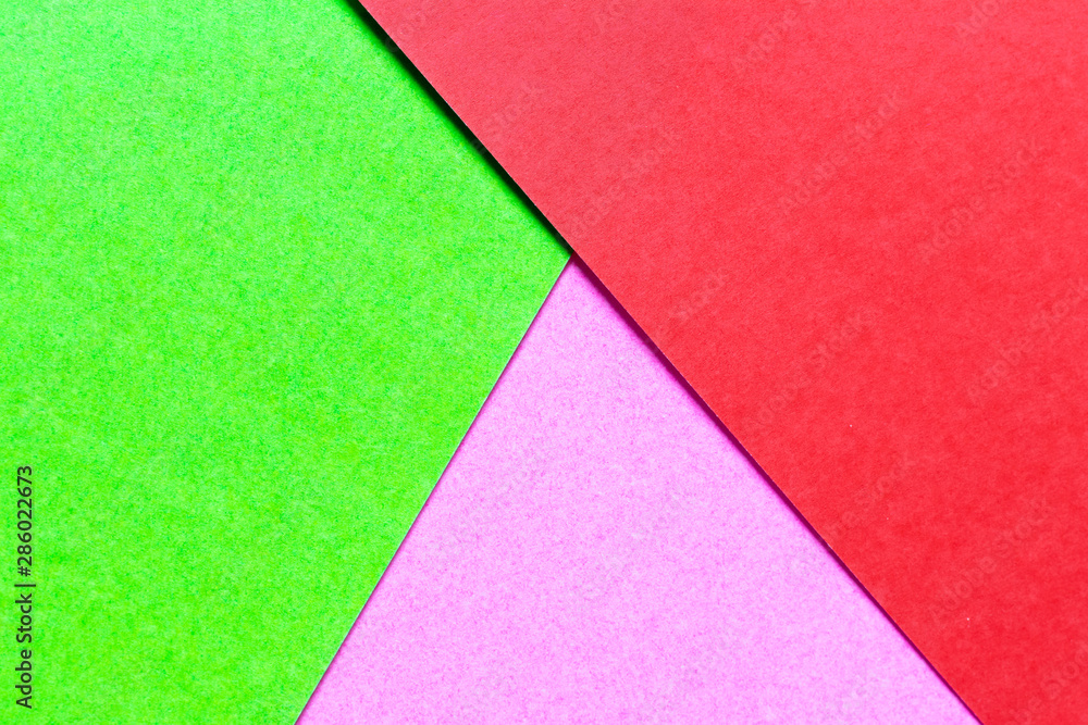 Abstract green, pink and red color paper textured background with copy space for design and decoration Abstract green, pink and red color paper textured background with copy space for design and decoration