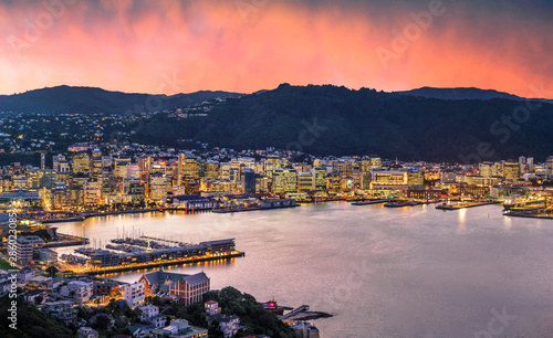 Fototapeta Naklejka Na Ścianę i Meble -  Wellington city and harbour at sunset from Mount Victoria. Wellington is the capital city of New Zealand and is located at the bottom of the North Island.