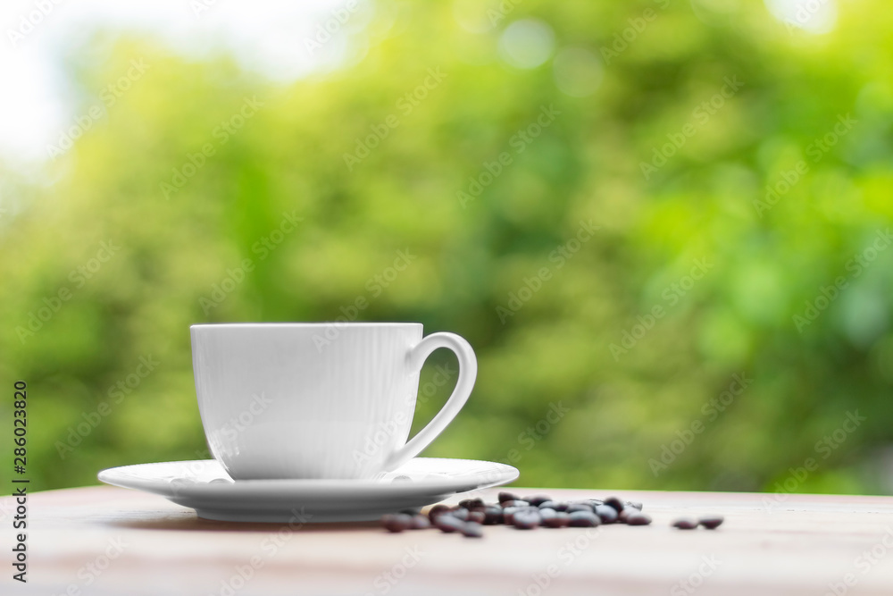 cup of coffee on wooden table cup of coffee on wooden table