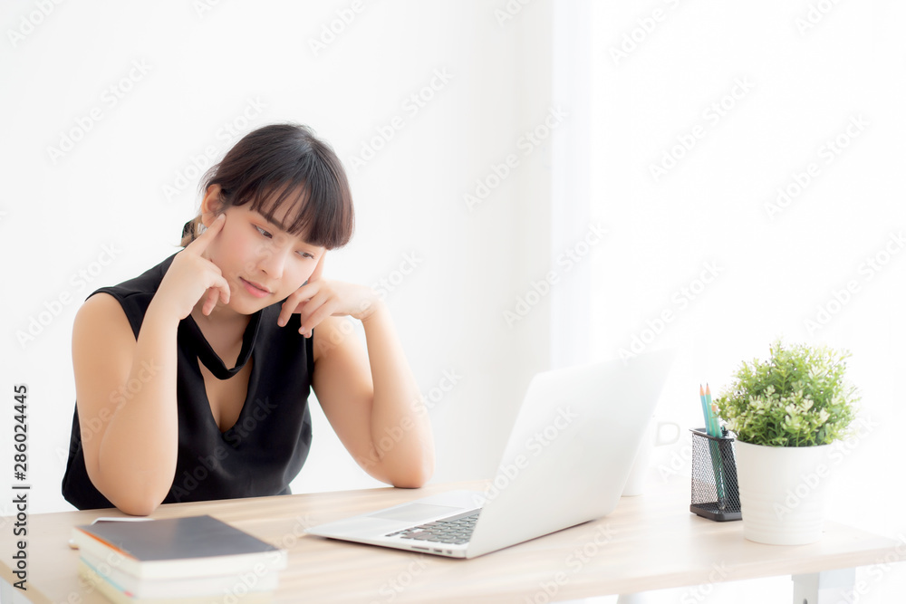 Beautiful freelance young asian woman thinking and idea working laptop computer at office, writer asia girl thoughtful inspiration writing blogging with notebook in job, business concept. Beautiful freelance young asian woman thinking and idea working laptop computer at office, writer asia girl thoughtful inspiration writing blogging with notebook in job, business concept.