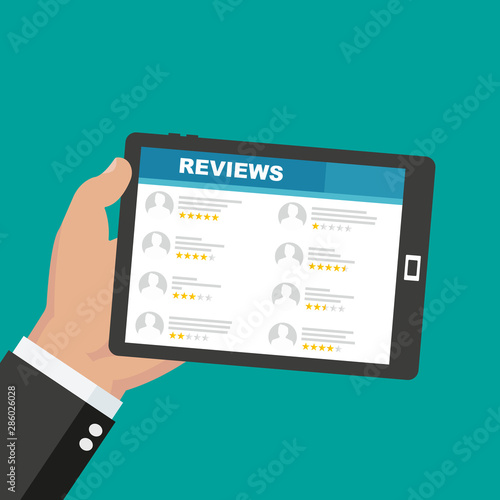 Hand holding a tablet with rating and reviews on the screen. Customer reviews, rating, classification. Vector Illustration