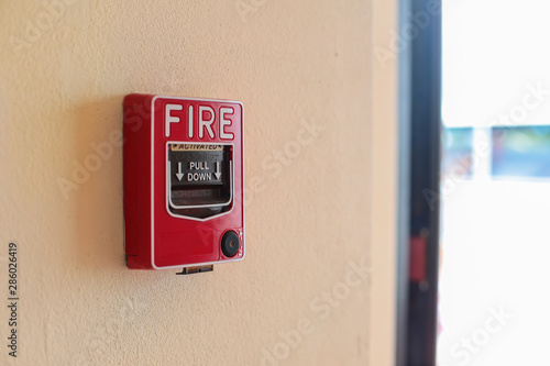 Fire alarm switch on the wall in factory. 