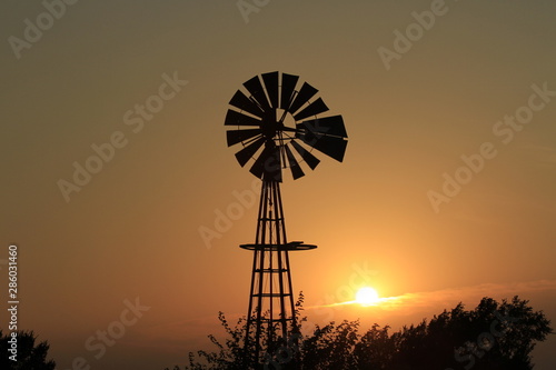 Kansas Windmill at Sunset with cloud's.