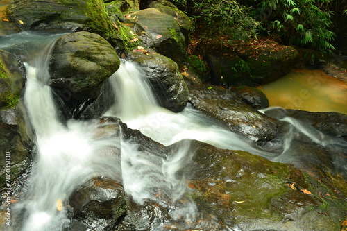 Water flowing over rocks at khao ito waterfall,prachin buri city,Thailand. photo