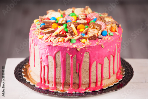 Pink cake at gray background