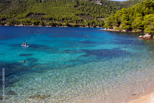 People enjoying summer on Vucine beach - Peljesac peninsula, Croatia