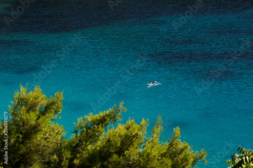 People enjoying summer on Vucine beach - Peljesac peninsula, Croatia photo