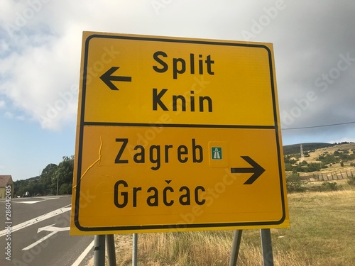 Table with direction to cities of Split, Knin, Zagreb and Gracac in Lika, Croati