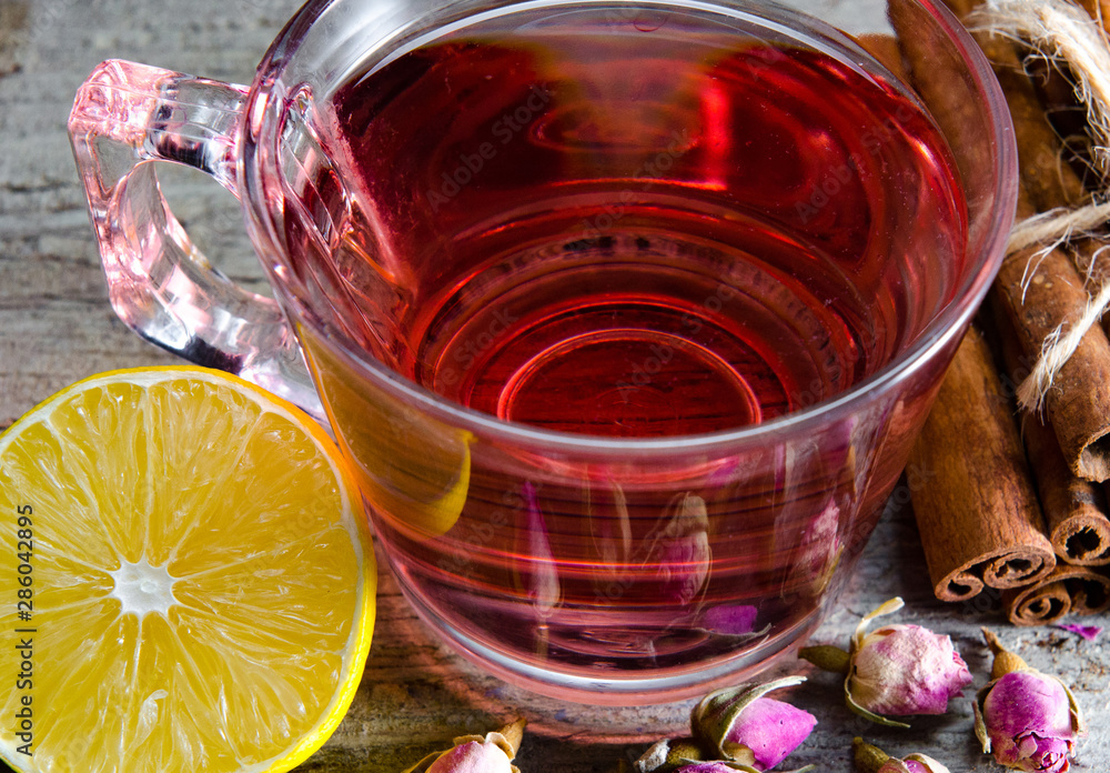 Fototapeta premium Fruit berry tea in the cup served on table