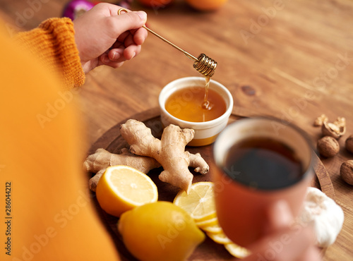 Warming tea with honey,  lemon  and ginger photo