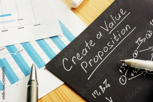 Create a Value proposition sign and business graphs.
