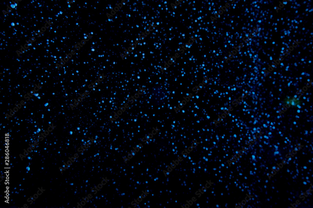 Abstract dust explosion on a black background Abstract dust explosion on a black background