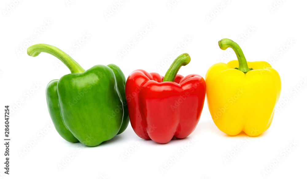 Green Red Yellow bell peppers group isolated on white backgroundon Green Red Yellow bell peppers group isolated on white backgroundon