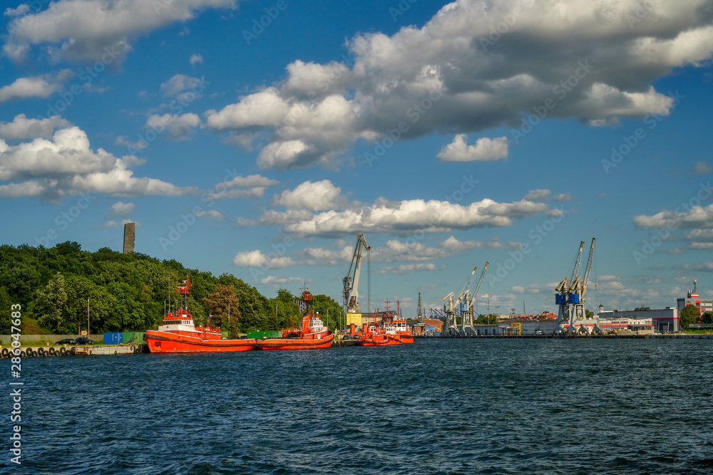 Fototapeta premium Port of Gdansk, Poland, tug on the way to the mooring
