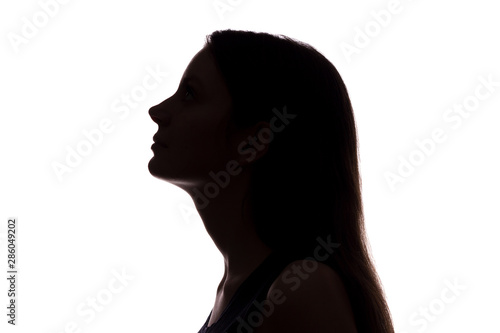 Young woman look ahead - horizontal silhouette