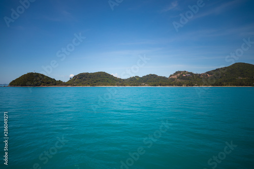 Looking at the Island, blue water and sky. © Martisz Media