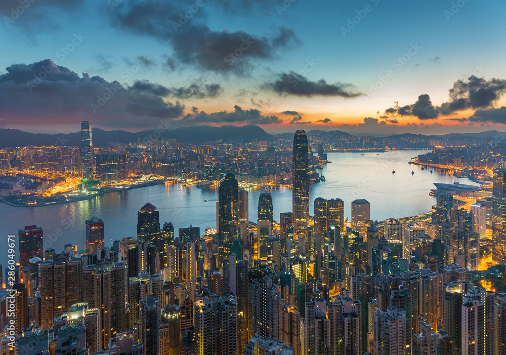 Victoria harbor of Hong Kong city at dawn - obrazy, fototapety, plakaty 