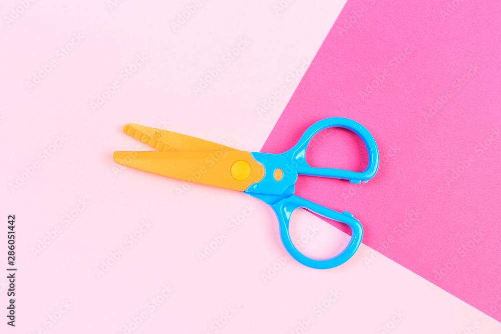 Minimal concept for scissor on pink background - Image Minimal concept for scissor on pink background - Image