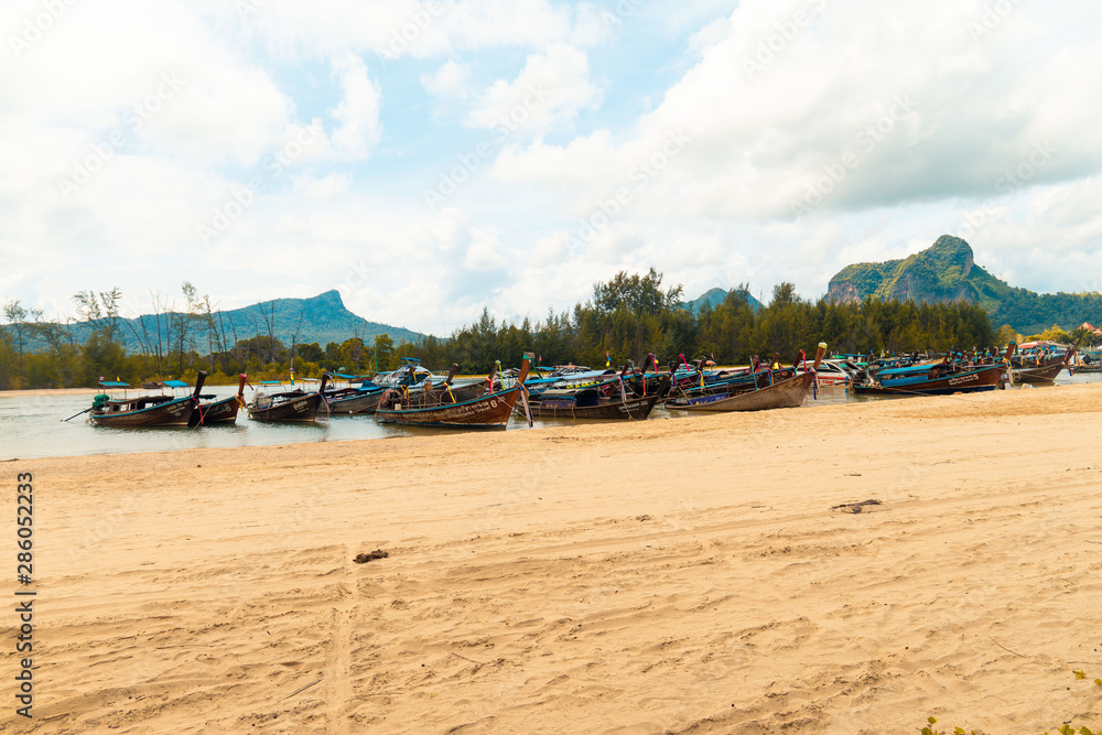 Fototapeta premium Looking at the boats on the beach