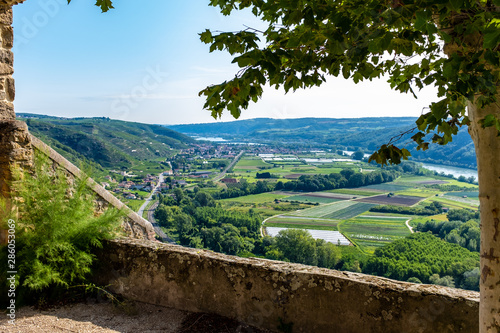 фотографія View on the Rhone valley from the church porch of Tupin-et-Semons, France