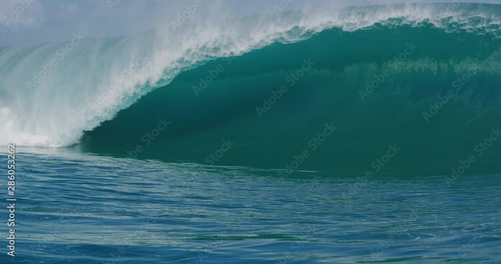 Amazing ocean wave breaking and barreling with spray, natural wonders of the sea Amazing ocean wave breaking and barreling with spray, natural wonders of the sea