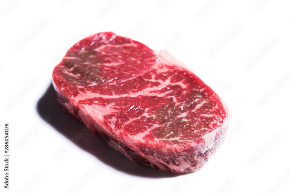 Fresh raw marble beef steak on background