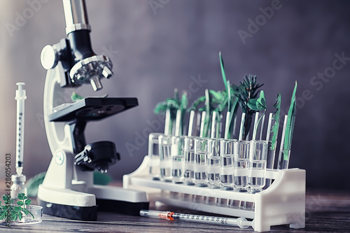 Microscope and test partings on the table in the laboratory.