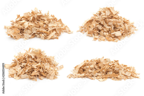 Pile of sawdust piles on white background photo