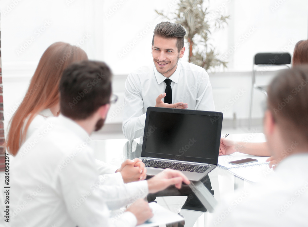business team holds a meeting in a bright office business team holds a meeting in a bright office