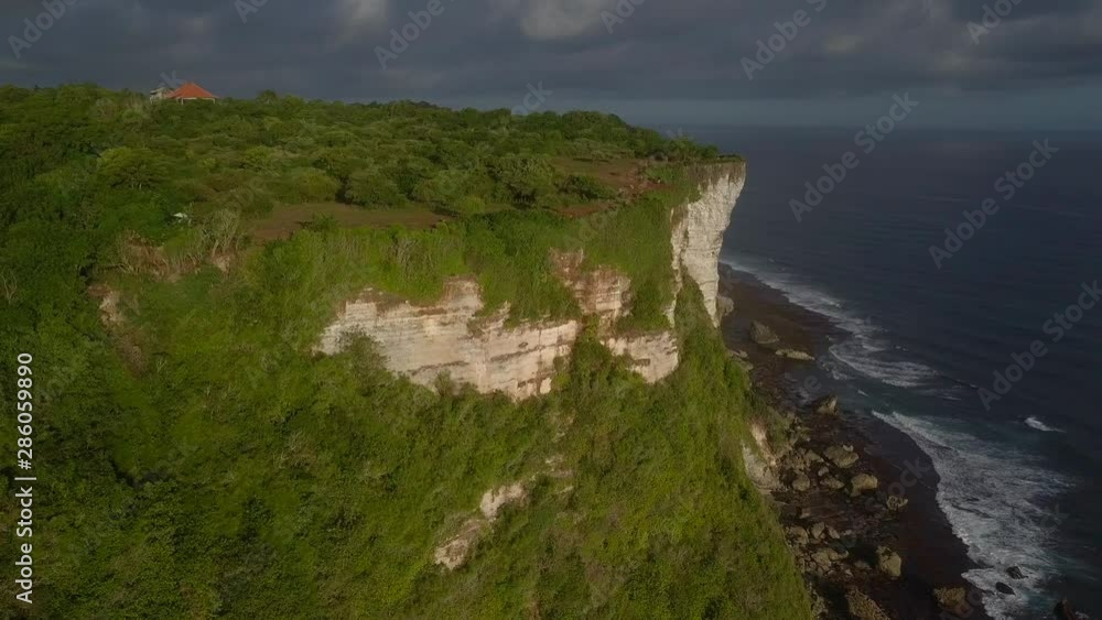 Aerial view of sea rocky coast with surf the waves Aerial view of sea rocky coast with surf the waves